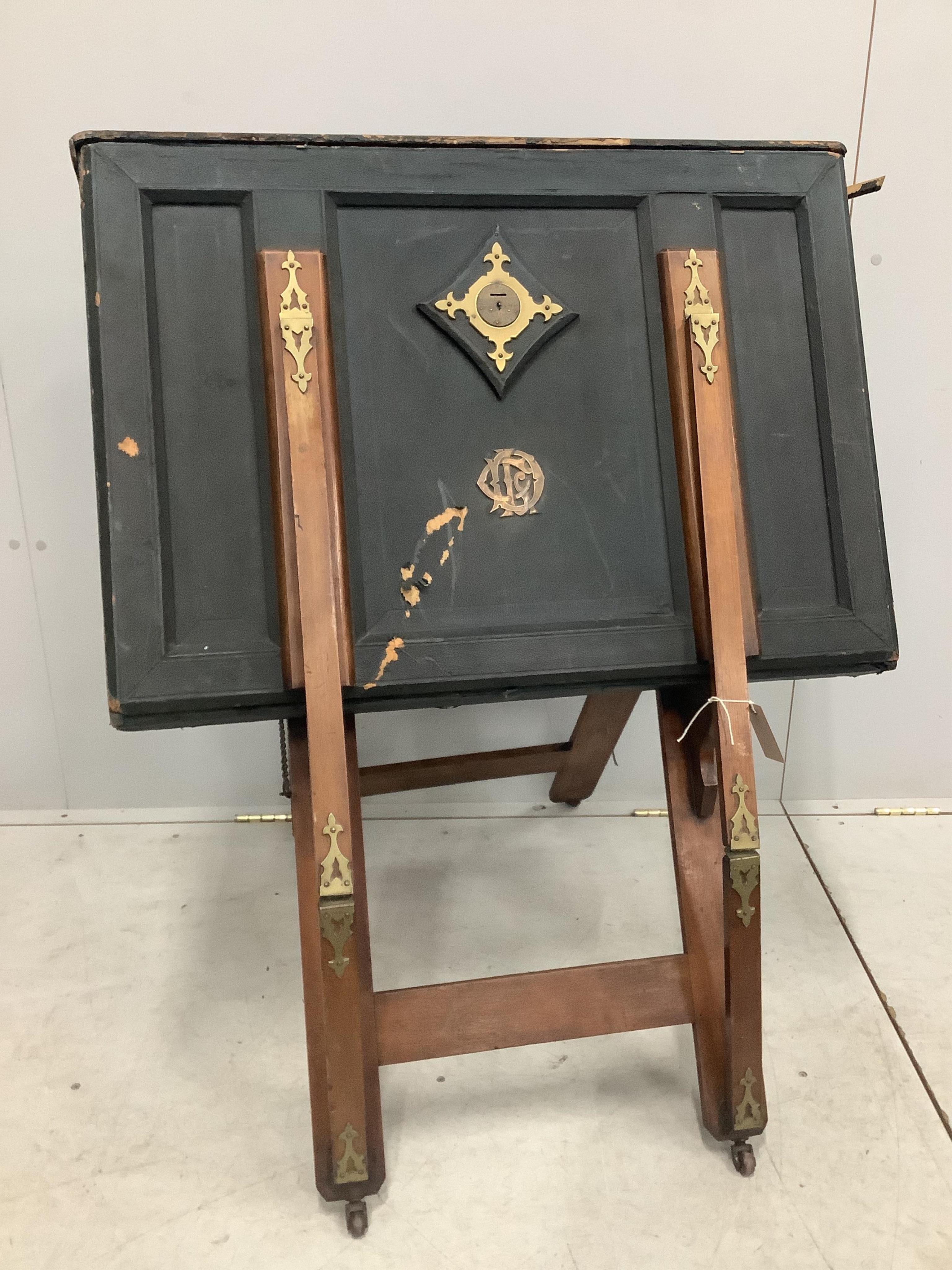 A Victorian brass mounted portfolio stand by Slade Bros. London, width 86cm. Condition - poor to fair